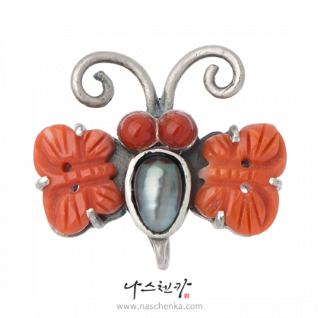 Butterfly coral brooch